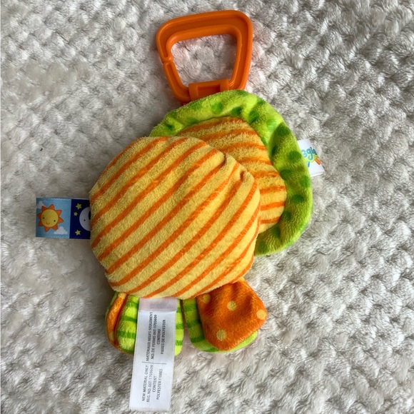 Taggies Plush Lion Squeeze Squeaker Hanging Stuffed Animal Toy - Picture 3 of 9